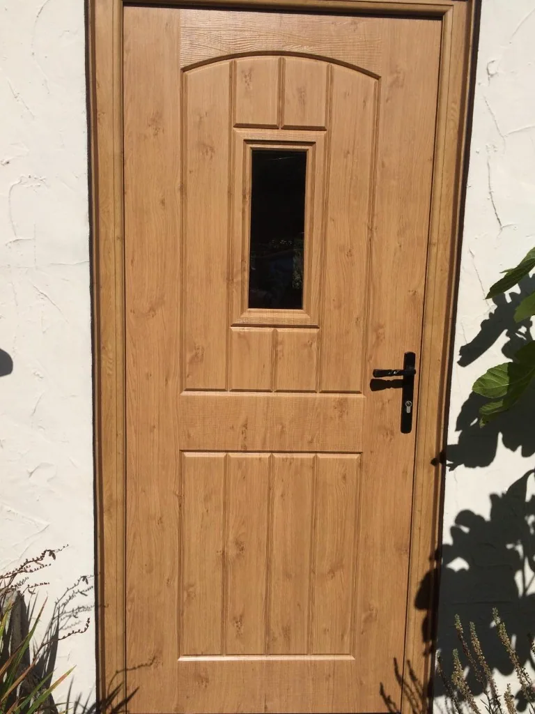 Composite front door in golden oak