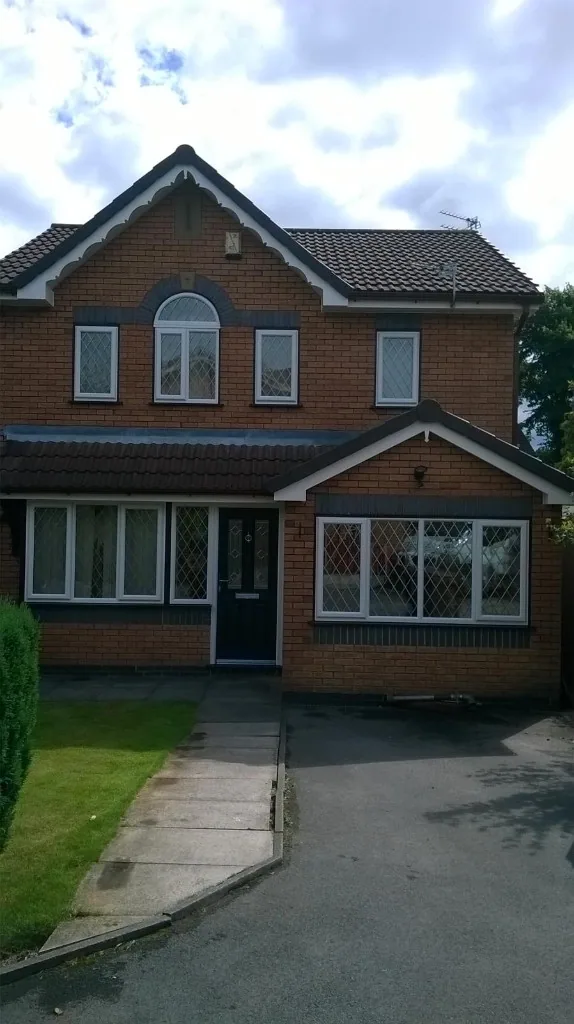 Full house white uPVC windows with diamond leaded glass