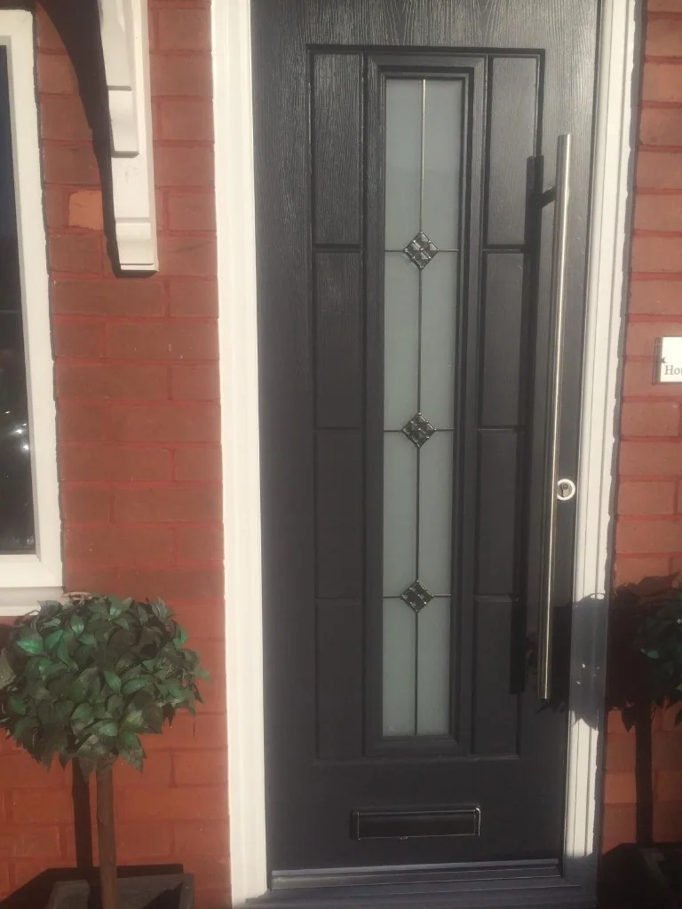 Anthracite grey composite door with long bar handle