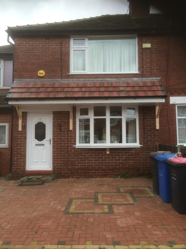 White uPVC bay window and matching front door
