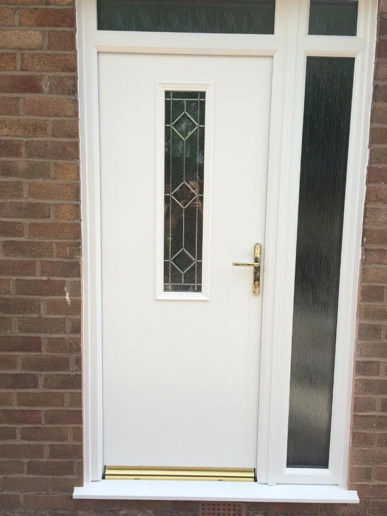 White composite front door with side panel and top light