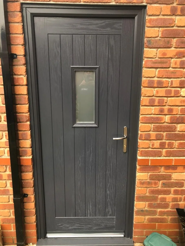 Anthracite grey composite cottage door with frosted glazing