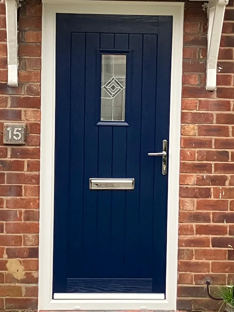 Navy blue composite front door with decorative glazing
