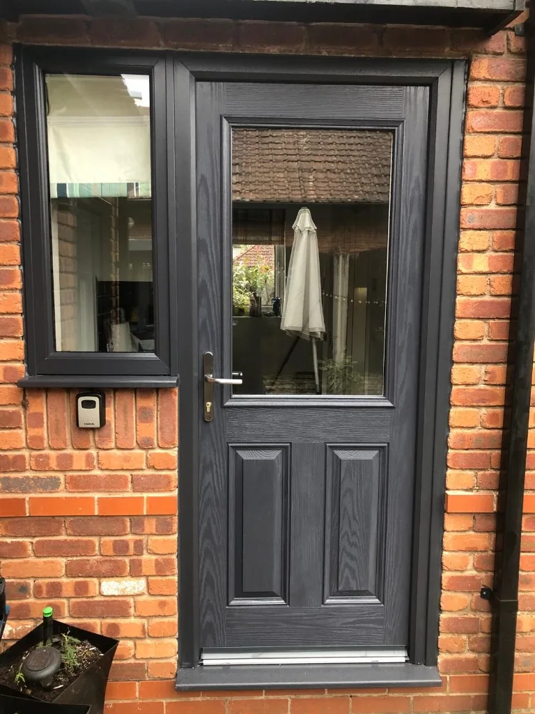 Anthracite grey composite door with matching side window